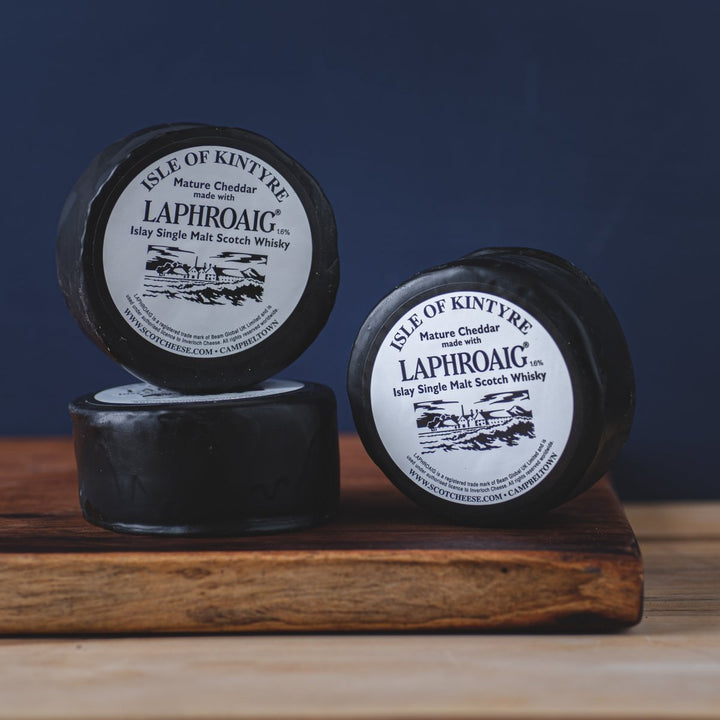 Laphroaig Whisky Cheddar Pucks - TOMME Cheese Shop. Delivering really good cheese across Ontario.