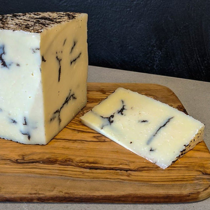 Truffle Manchego - TOMME Cheese Shop. Delivering really good cheese across Ontario.
